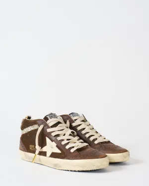 mid star leather toe spur and star suede upper horsy heel